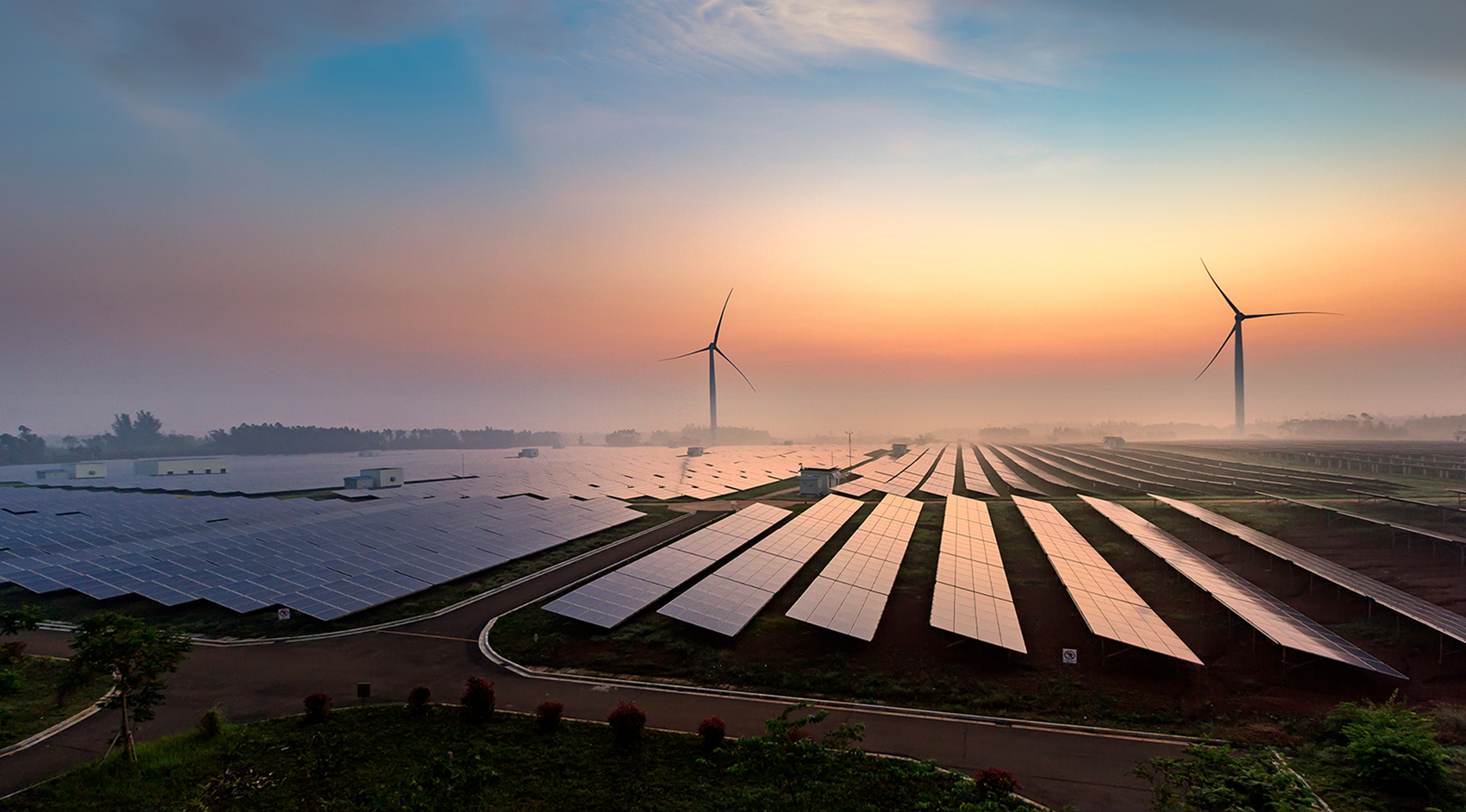 Renewables at sunrise_1700px_AdobeStock_263381718